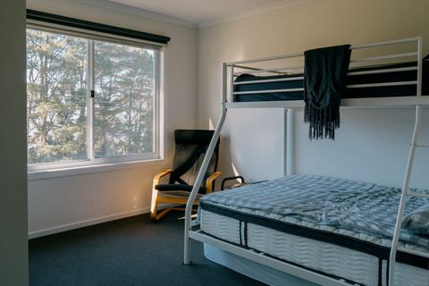 Second bedroom with double bed and single bunk bed